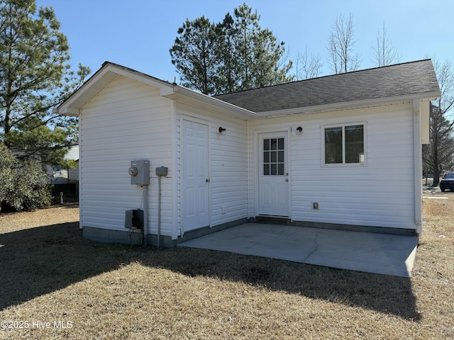 rear view of house with a patio