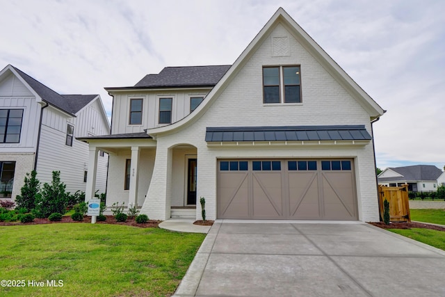 modern farmhouse style home featuring a garage, covered porch, and a front lawn