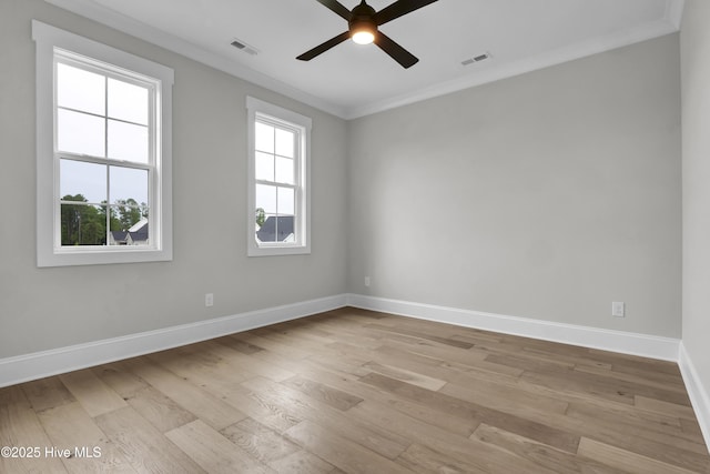 unfurnished room with ceiling fan, ornamental molding, and light hardwood / wood-style floors