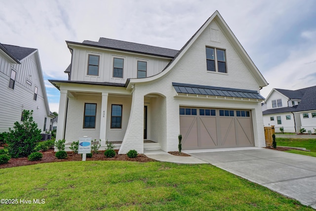 modern farmhouse style home with central AC, a porch, a garage, and a front lawn