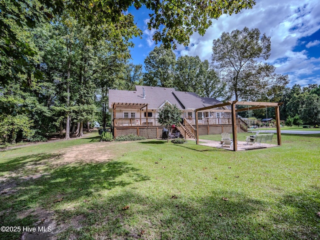 view of yard featuring a pergola and a deck