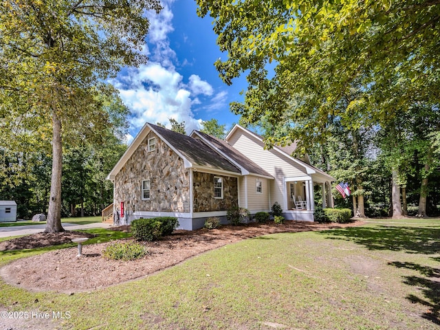 view of front of property with a front lawn