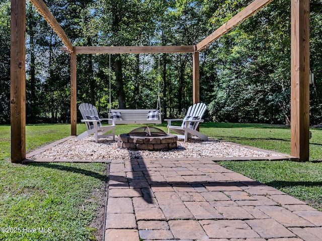 view of patio featuring a fire pit