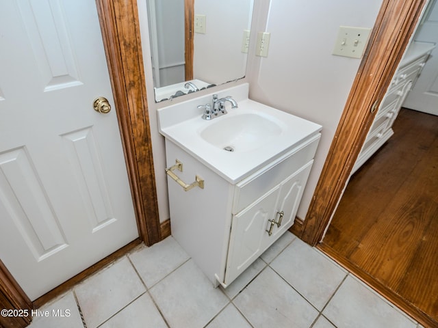 bathroom with vanity and tile patterned floors