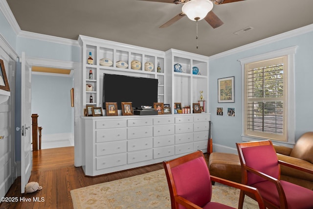 bedroom featuring ornamental molding and dark hardwood / wood-style floors