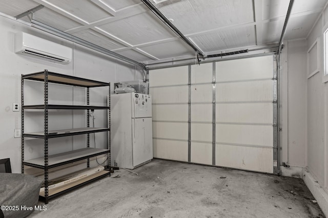 garage with a wall unit AC and white fridge