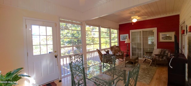 dining space with wood-type flooring, wood ceiling, and ceiling fan