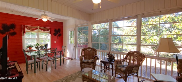 sunroom / solarium with ceiling fan