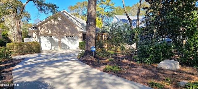 view of side of property featuring a garage