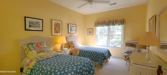 bedroom with ceiling fan and carpet flooring