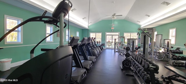 exercise room featuring ceiling fan, vaulted ceiling, and a healthy amount of sunlight