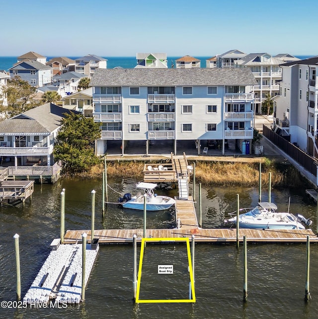 dock area with a water view