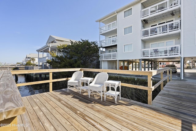 dock area featuring a water view