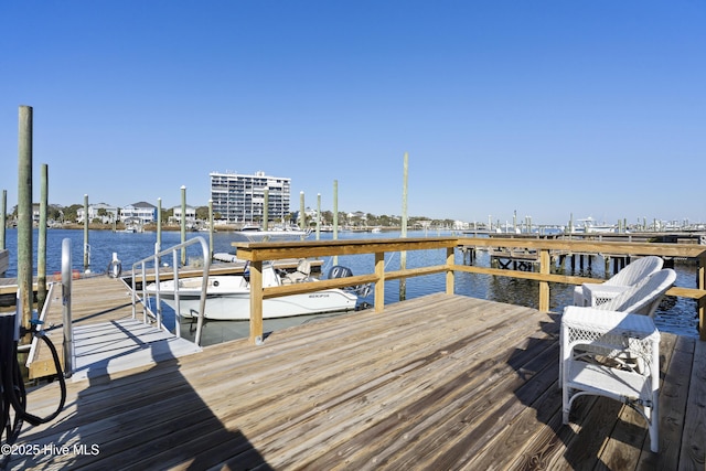 dock area featuring a water view