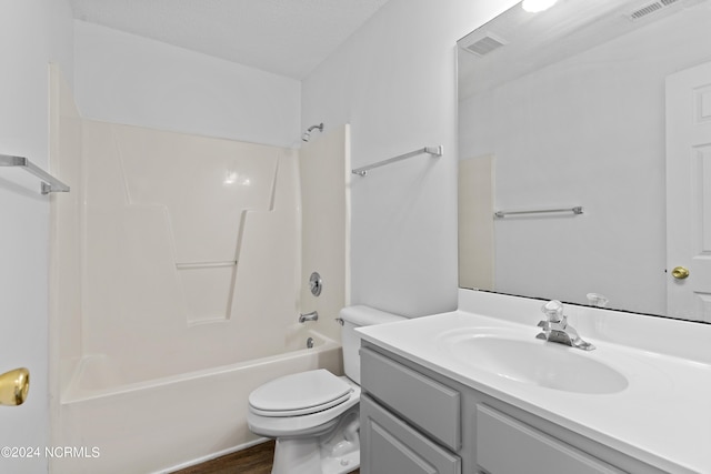 full bathroom featuring vanity, shower / bathtub combination, and toilet