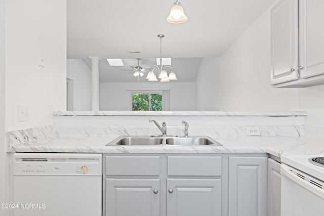 kitchen with white dishwasher, sink, hanging light fixtures, and white cabinets