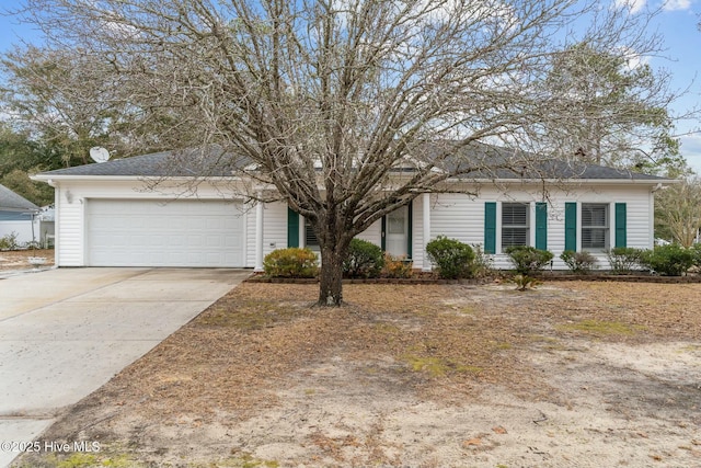 ranch-style home with a garage