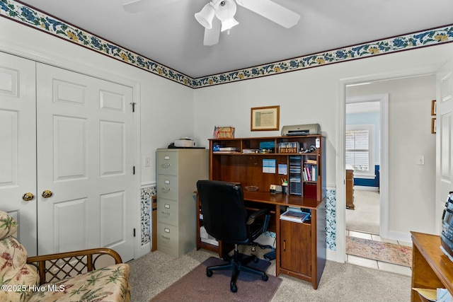 office space with ceiling fan and light colored carpet