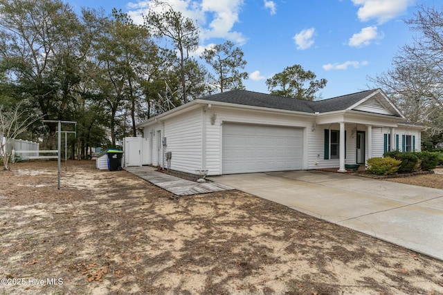 ranch-style house featuring a garage