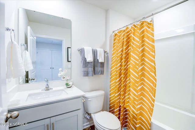 full bathroom featuring vanity, shower / bathtub combination with curtain, and toilet