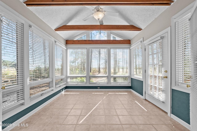 unfurnished sunroom with ceiling fan and lofted ceiling