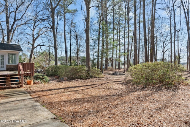 view of yard with a deck