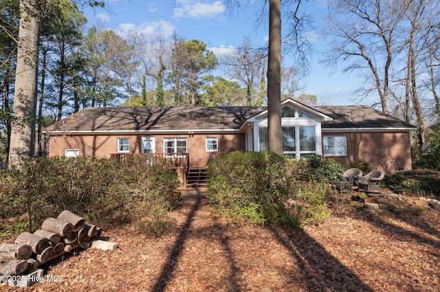 view of front of house with a deck