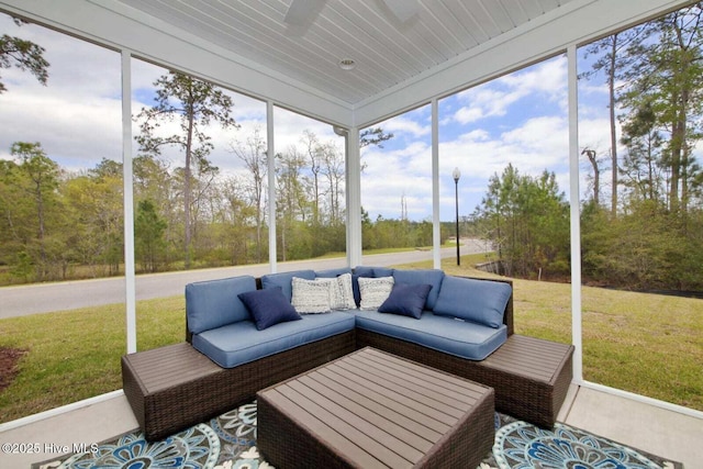 253 Hawks Run Dr Unit 4060, Carolina Shores, NC 28467 - sunroom with an outdoor hangout area and view of wooded area