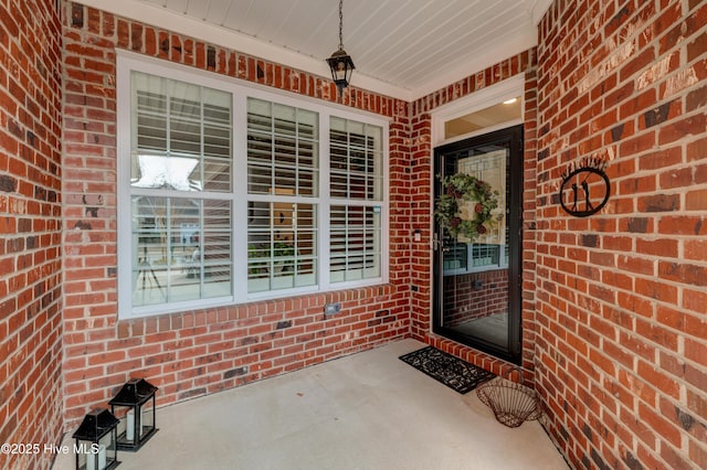 doorway to property featuring a porch