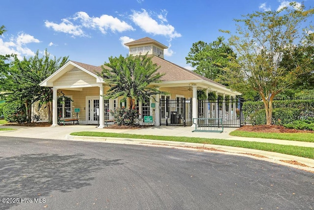 exterior space featuring french doors and ceiling fan