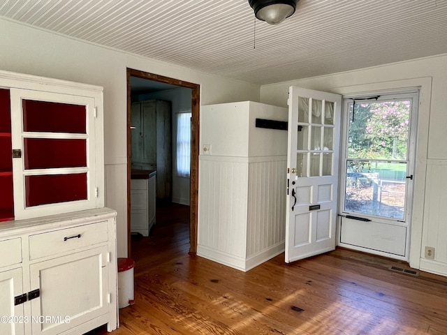 doorway to outside featuring dark hardwood / wood-style floors