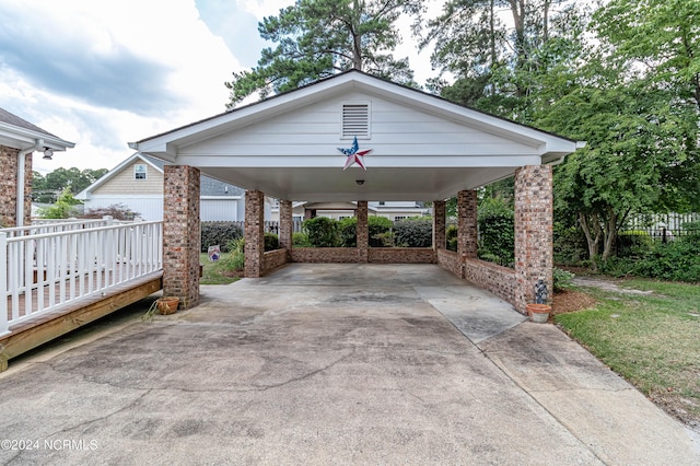 view of patio / terrace featuring a carport