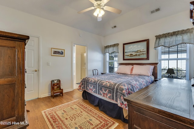 bedroom with ceiling fan and light hardwood / wood-style flooring