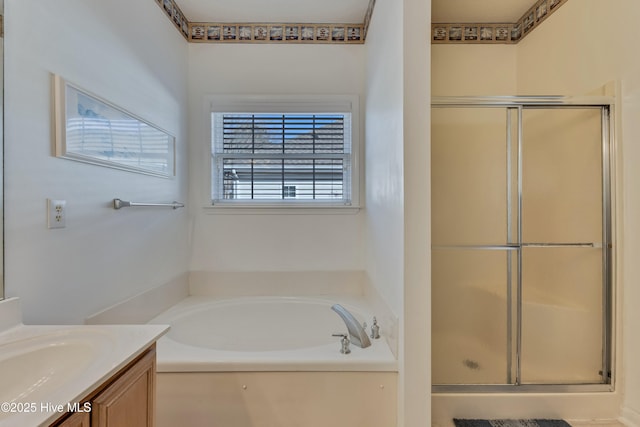 bathroom with vanity and plus walk in shower