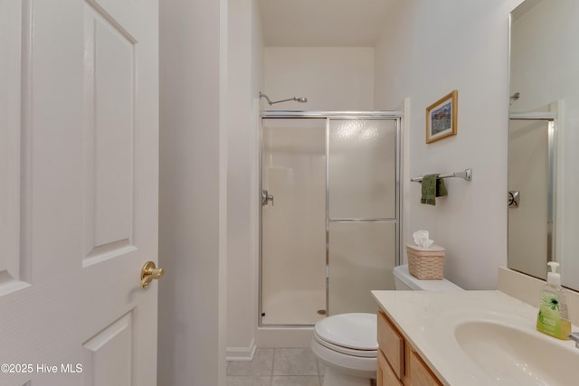 bathroom with vanity, an enclosed shower, tile patterned floors, and toilet