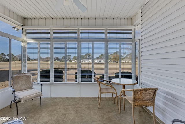 sunroom / solarium with ceiling fan