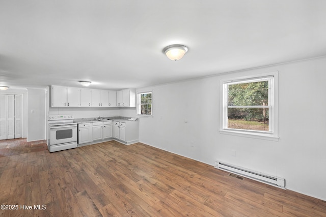 kitchen featuring dark hardwood / wood-style floors, white electric stove, white cabinetry, sink, and a baseboard heating unit