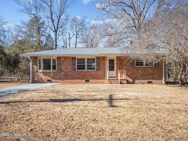 ranch-style home with a front yard