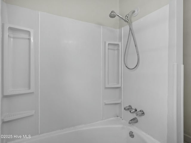 bathroom with tub / shower combination