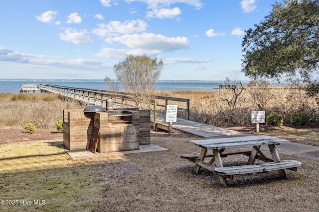 exterior space with a water view