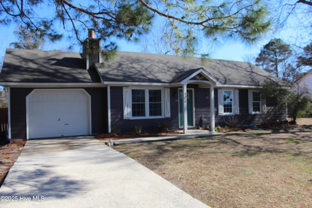 single story home with a garage and a front yard