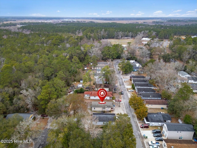 birds eye view of property with a residential view