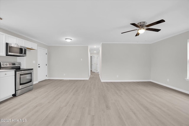 interior space featuring baseboards, light wood-style floors, and crown molding