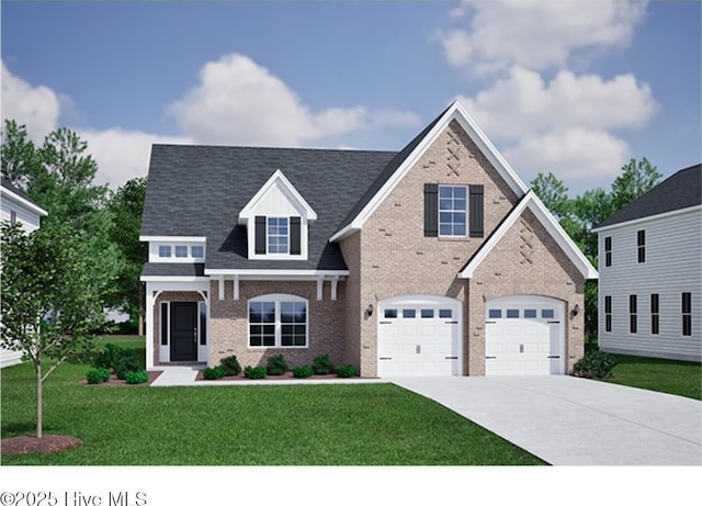 view of front of house featuring a garage and a front yard