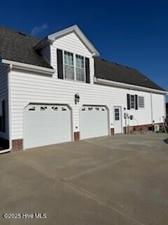 exterior space with a garage