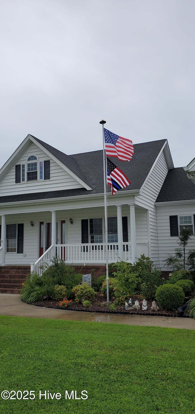 view of front of home with a front yard