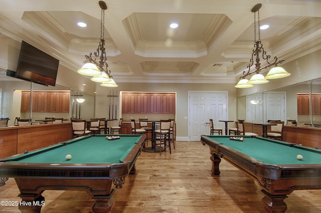 recreation room featuring coffered ceiling, pool table, crown molding, and light wood-style flooring