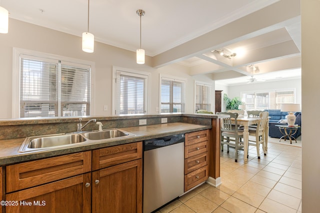 kitchen with sink, dishwasher, hanging light fixtures, light tile patterned flooring, and beamed ceiling