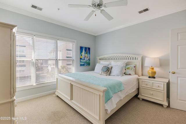 bedroom with light carpet, crown molding, and ceiling fan