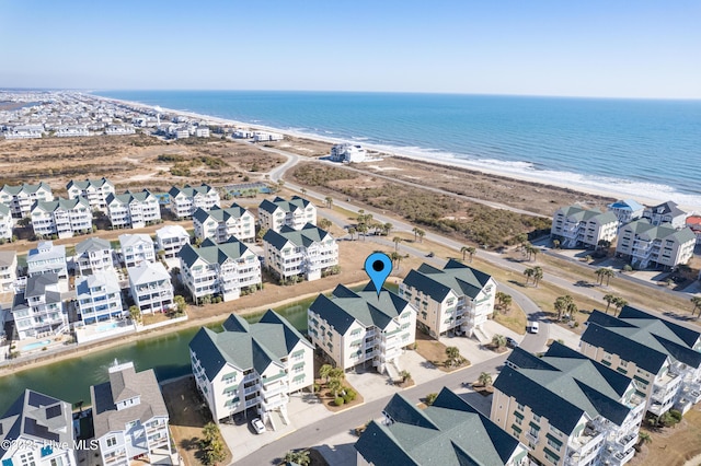 aerial view featuring a beach view and a water view